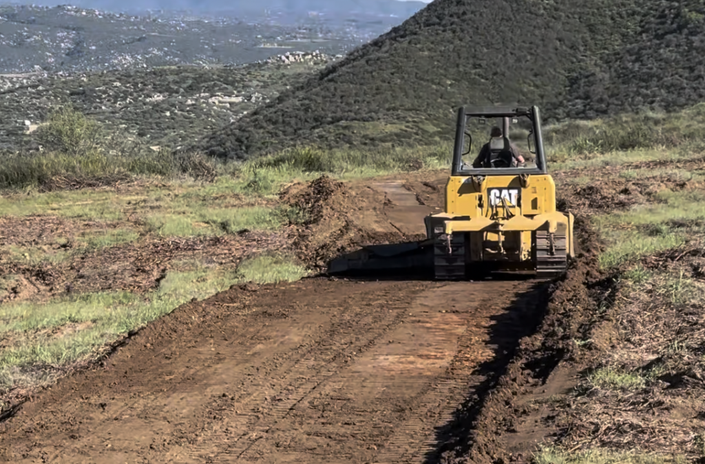 Bulldozer grading a road